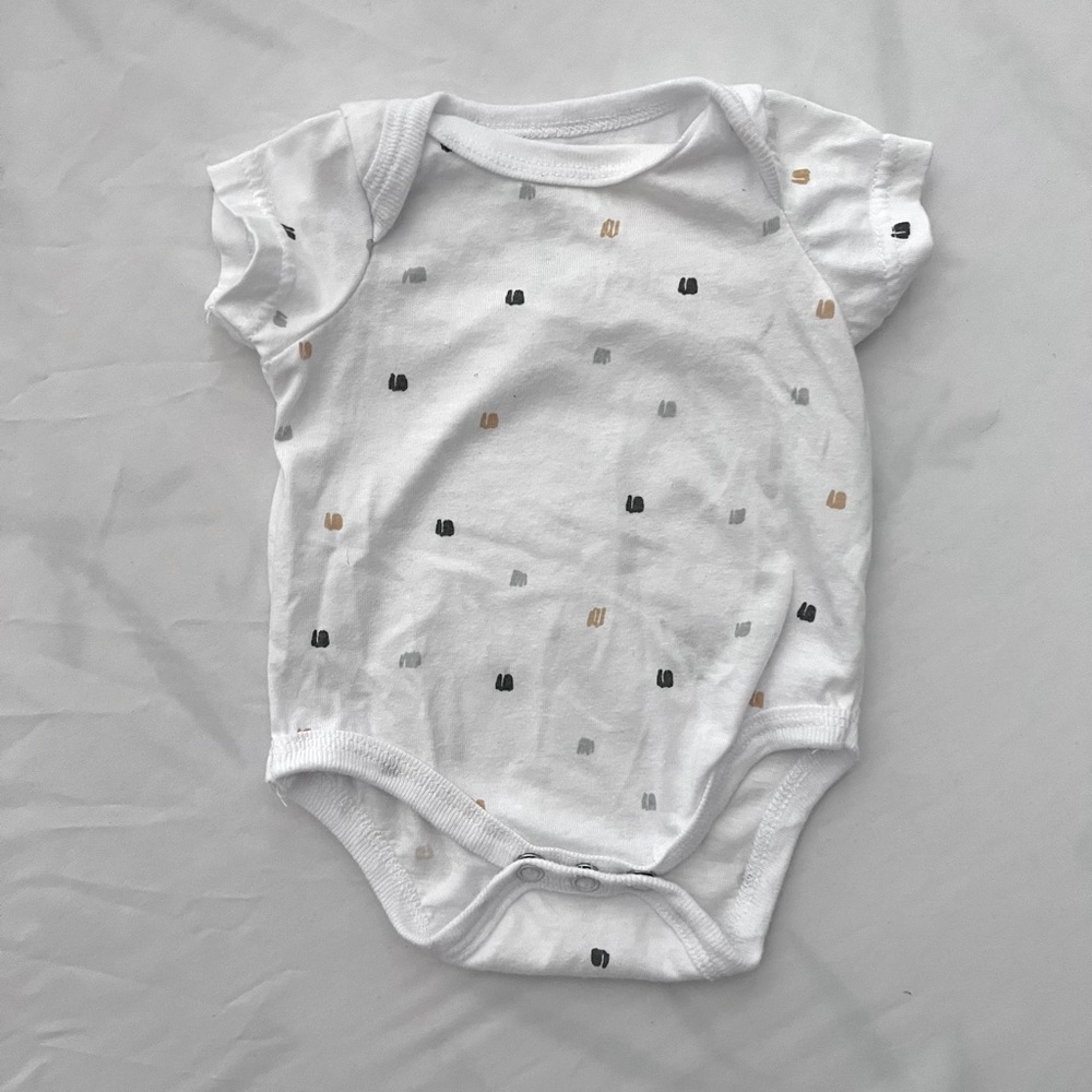 White NB onesie slightly worn